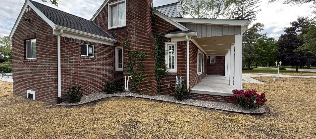 From Basic to Beautiful: Expansive Front Porch Addition & Hardscaping